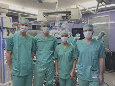 Our team is getting ready to test FAROS technology in the operating room. From left to right: [Tom](/author/tom-vercauteren/), [Martin](/author/martin-huber), [Anisha](/author/anisha-bahl), and [Matt](/author/matthew-elliot).