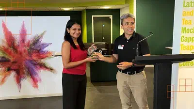 Navodini receives her prizes at the MRC DTP Symposium.