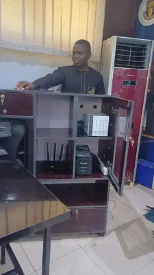 The newly installed NAS system, backup power supply, and local networking equipment.