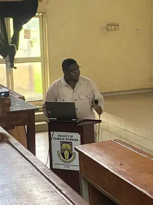 Oluwatosin Alabi answering questions following the departmental presentation.